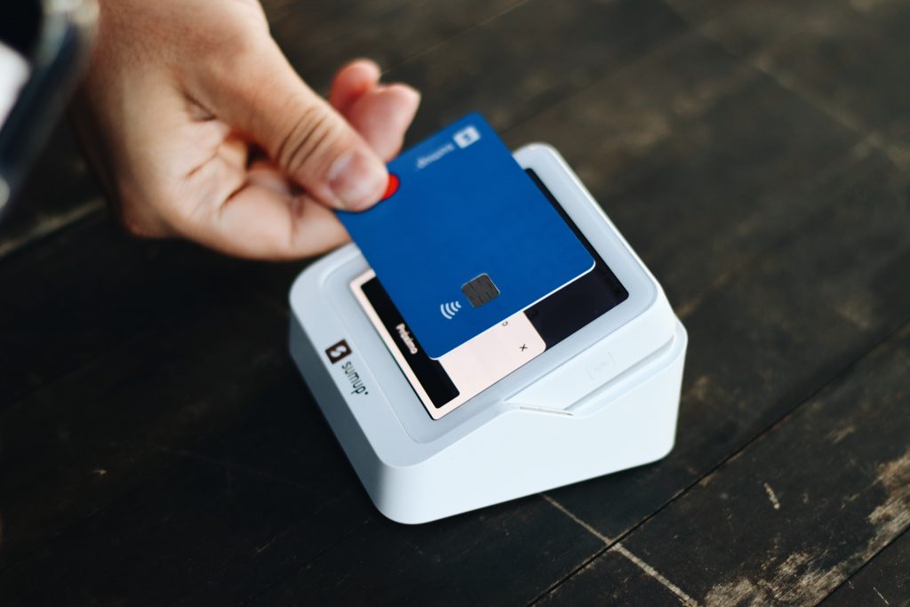 customer making a payment with their card using finance options