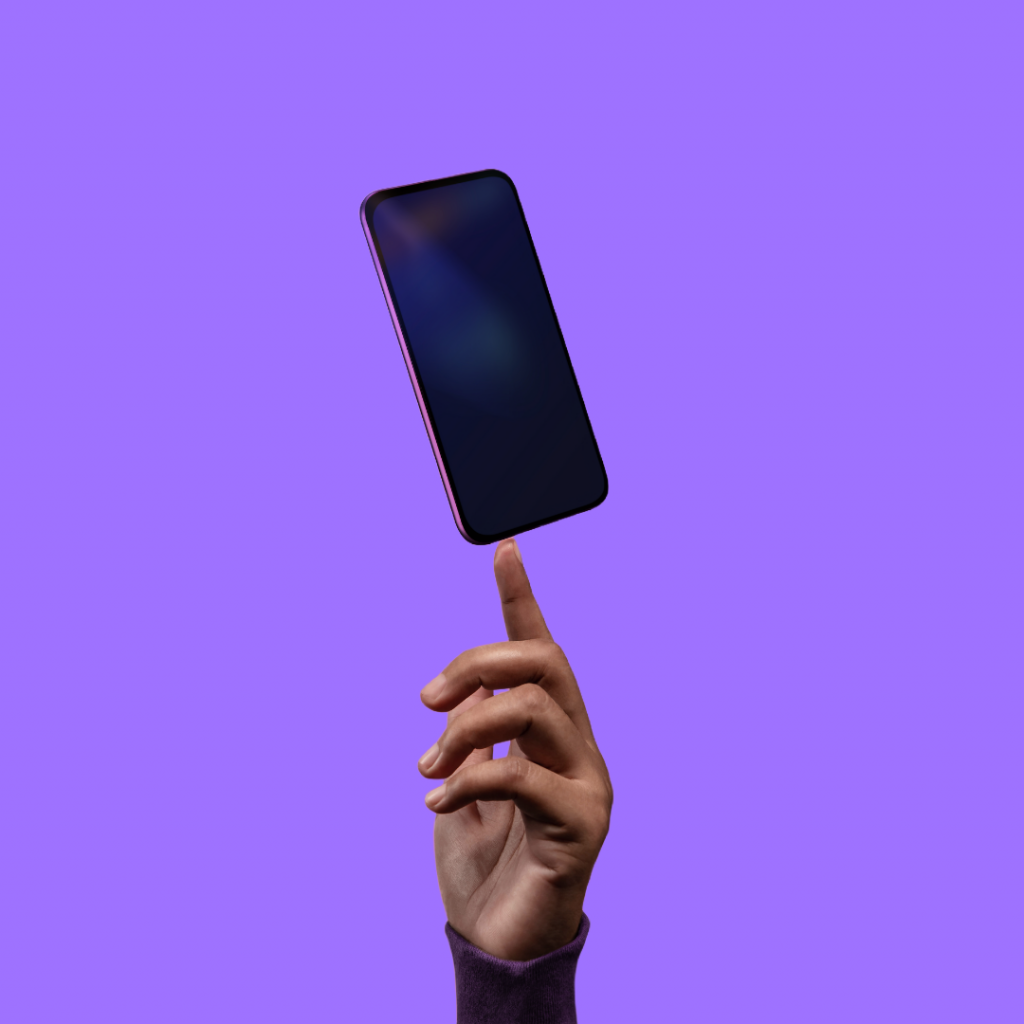 A phone balancing on a finger with the text 'We aim to help make your life easier.'